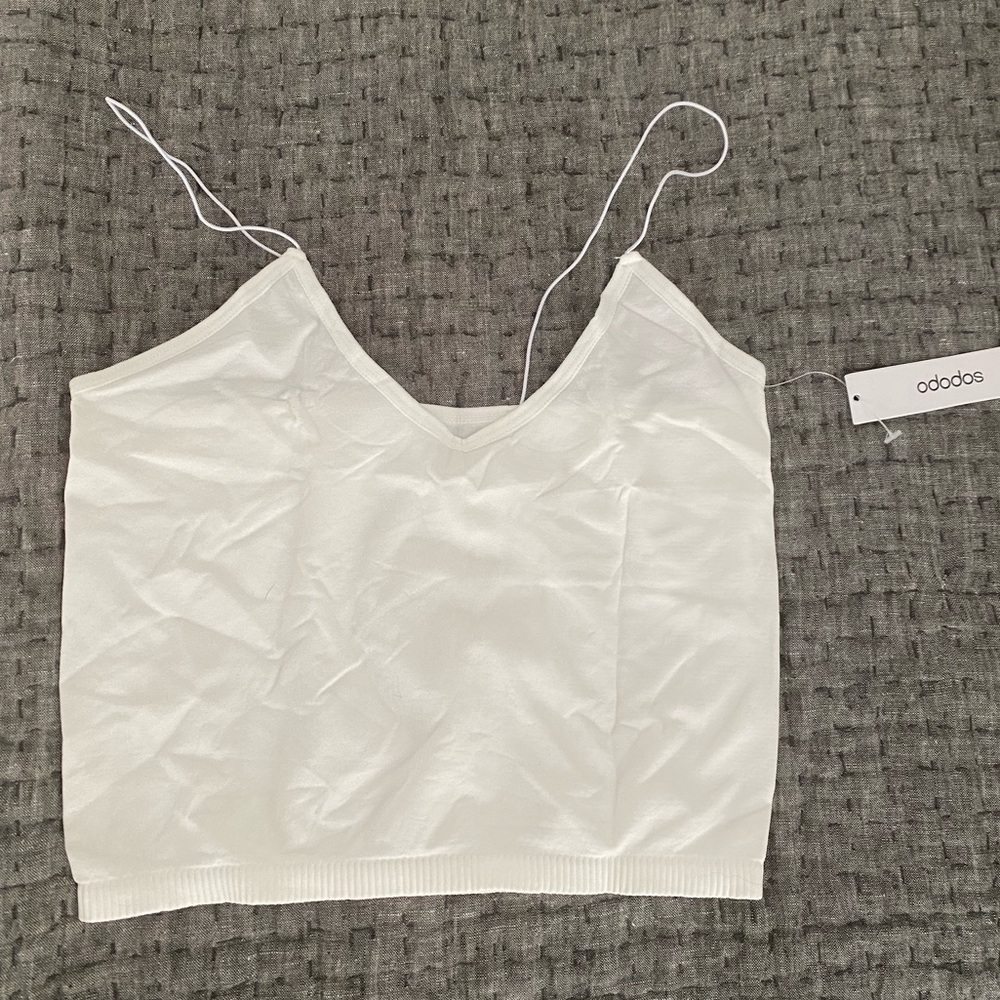 Two pack, tan and white spaghetti strap tank top. Black pictured for reference